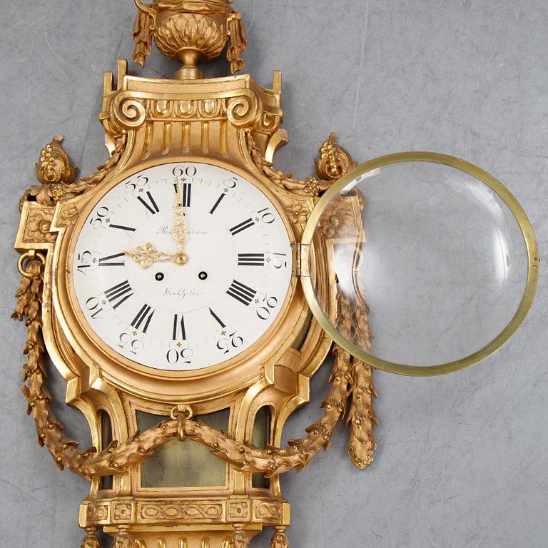 A gustavian style wall clock, signed Rob. Engström, Stockholm. First half of the 20th century.