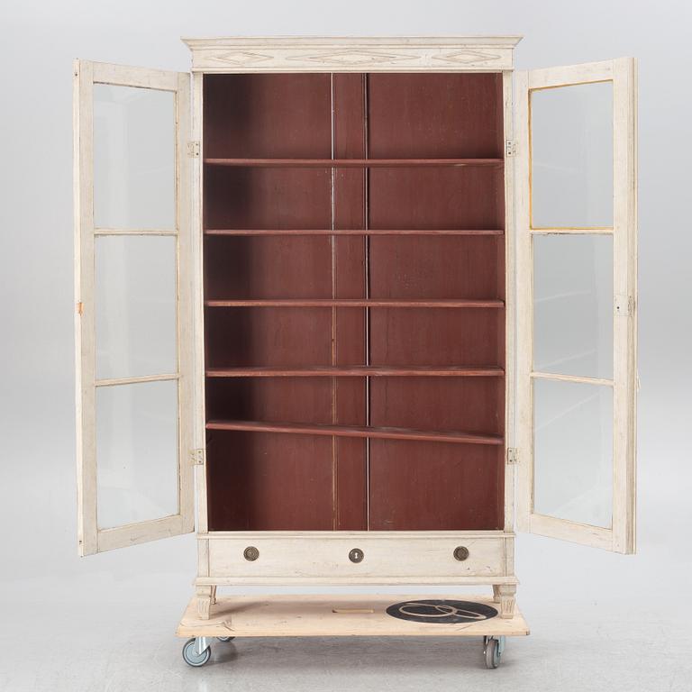 A Gustavian style display cabinet, circa 1900.