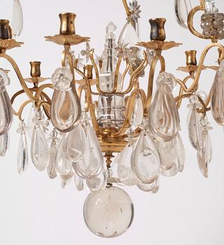 A Baroque-style 20th century nine-light chandelier.