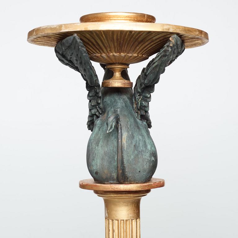 A pair of late Gustavian candle stands, early 19th century.