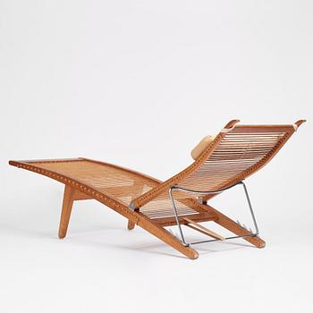 Hans J. Wegner, an oak lounge chair model "JH 524", Johannes Hansen, Copenhagen.