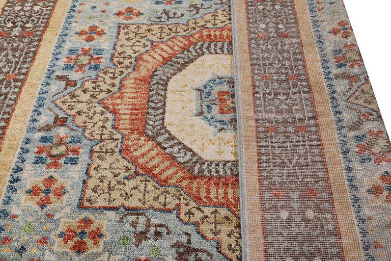 A carpet of Mamluk design, c. 365 x 255 cm.