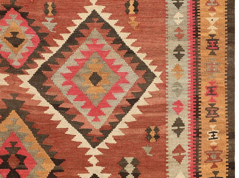 A Persian Nomad Kilim carpet, c 270 x 173 cm.