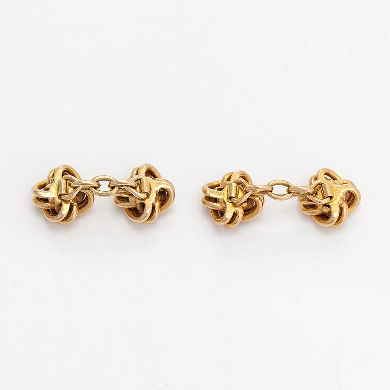 A pair 18K gold of cufflinks.