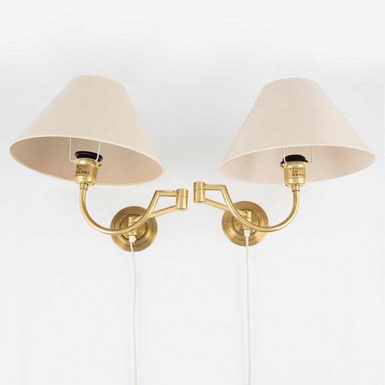 A pair of brass wall lamps, EWÅ, later part of the 20th century.