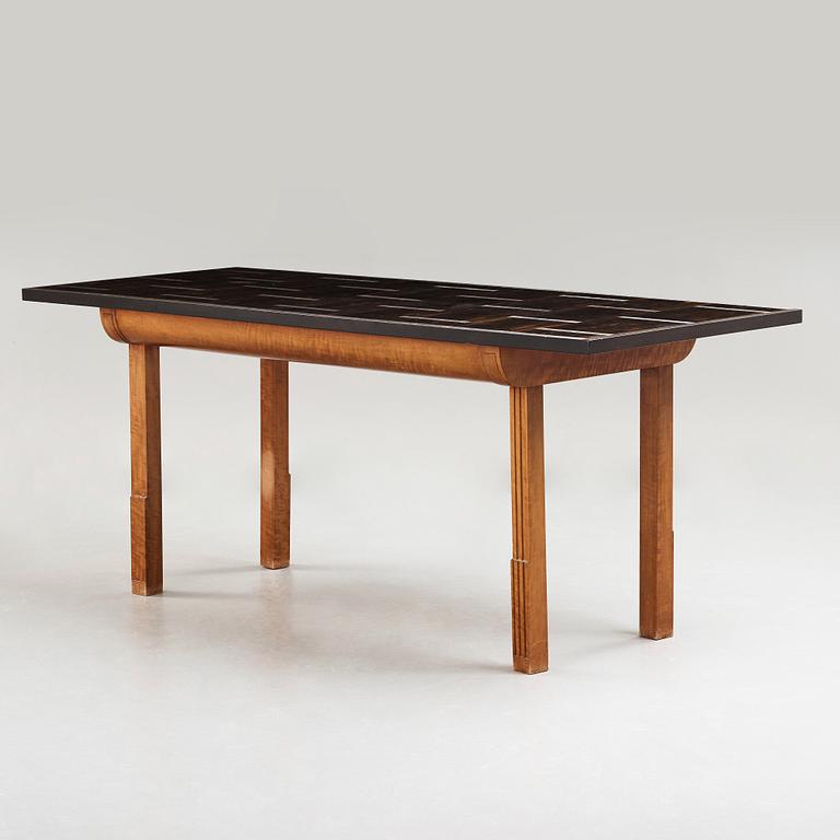 Hjalmar Jackson, A Hjalmar Jackson ebony and pearwood desk/library table, Stockholm ca 1934.