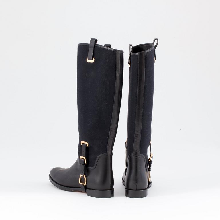 RALPH LAUREN, a pair of black canvas and leather boots. Size US 8.