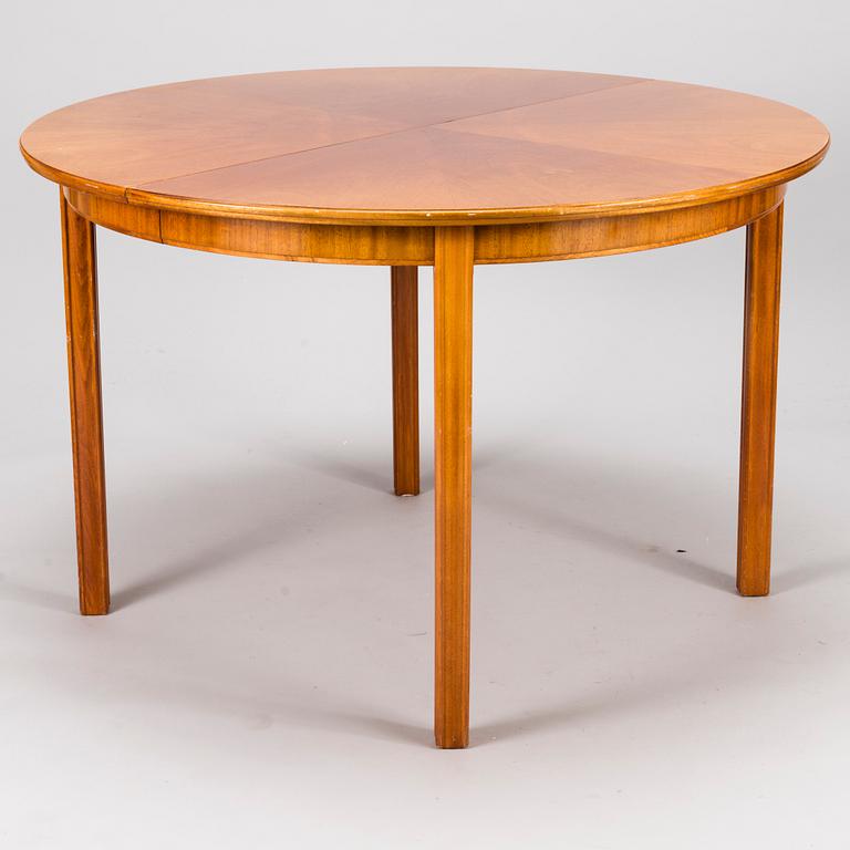 A 1940s-50s Dining Table.