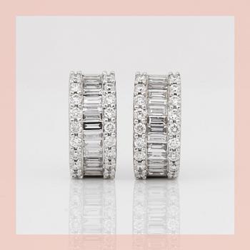 EARRINGS, huggies with round and baguette cut diamonds circa 1.3cts.