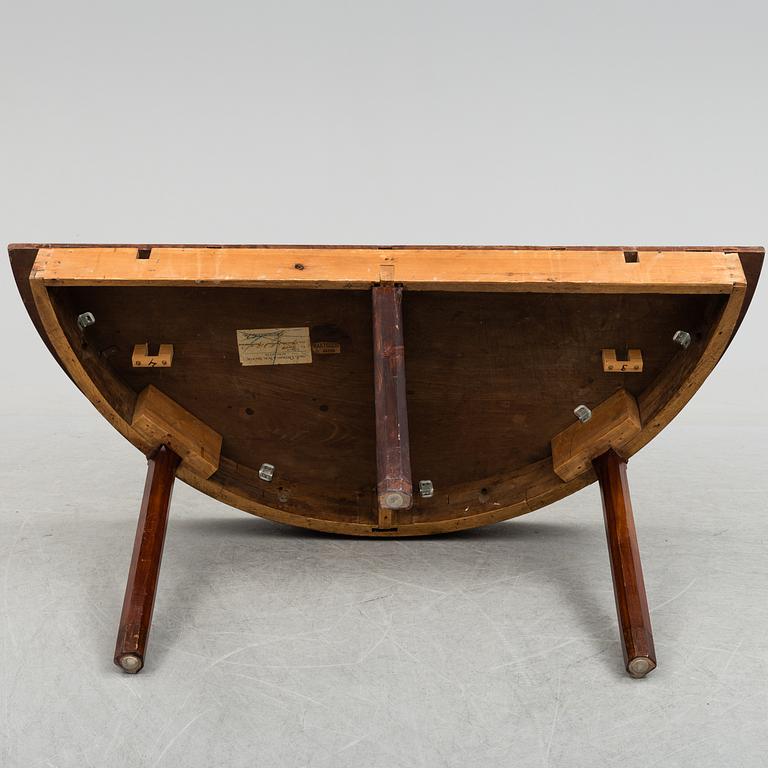 A 19th century mahognay veneer table.