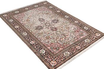 A silk Kashmir carpet, c. 267 x 185 cm.