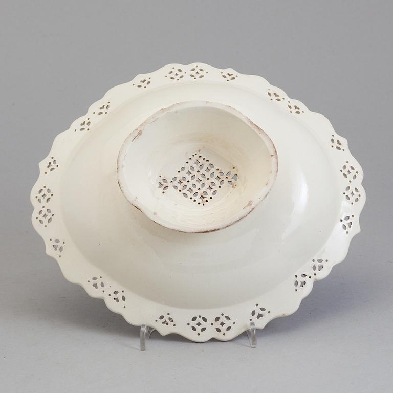 A CREAMWARE DISH, probably England, 18th century.