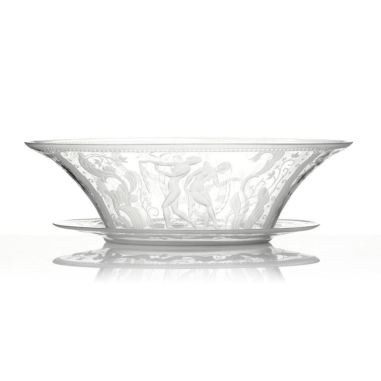 Simon Gate, an engraved Swedish Grace glass bowl on a plate, Orrefors, Sweden 1926, model 147.