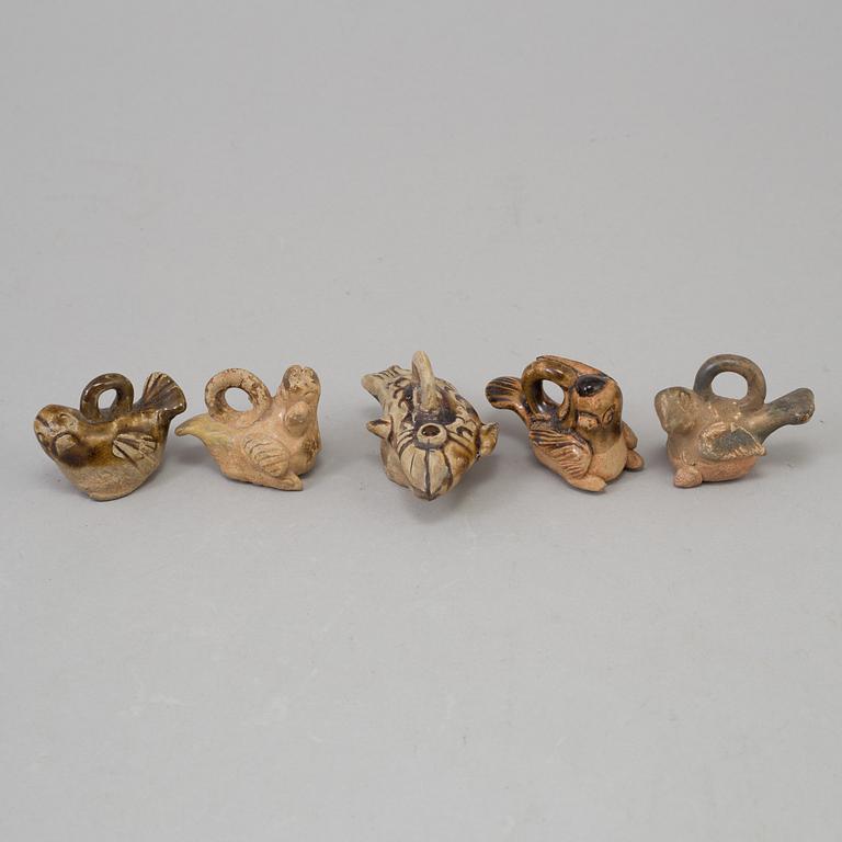 Nine chinese ceramic figures, tang dynasty (618-907).