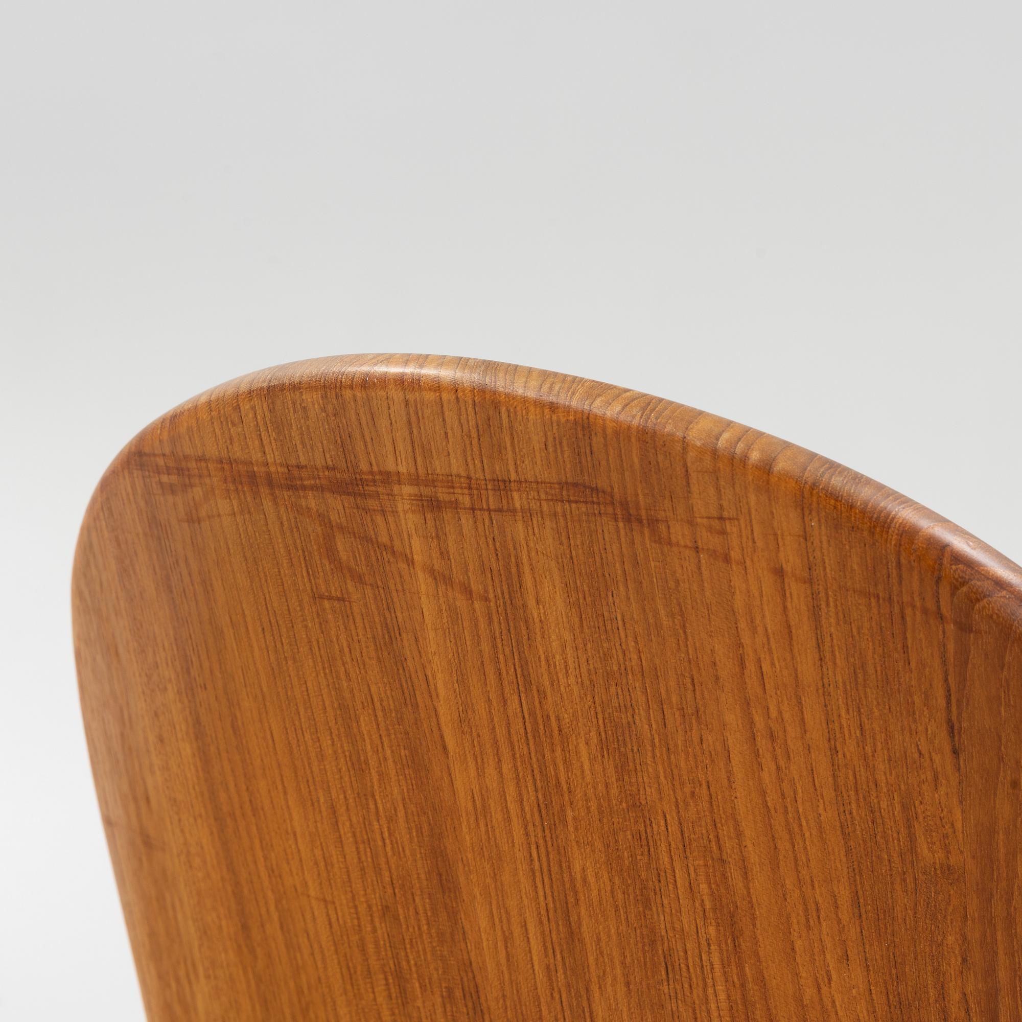 Niels Koefoed, six teak dining chairs upholstered in new sheepskin, Denmark, 1960's.