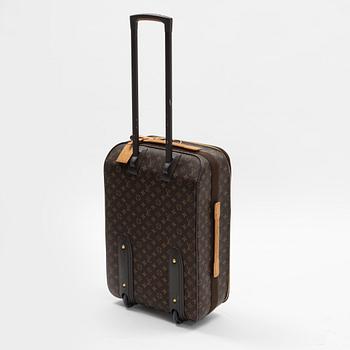 A monogram printed leather "Pegase 45" cabin bag by Louis Vuitton.