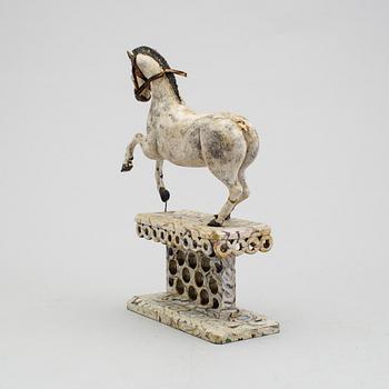 A painted folk art horse figure 19th century.