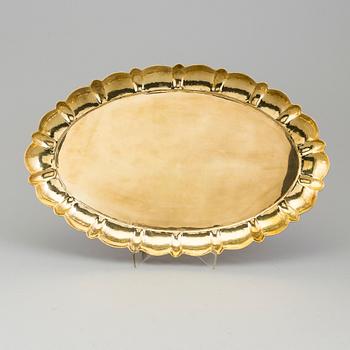 LARS HOLMSTRÖM, a brass tray and a set of 3 plates, from Arvika.