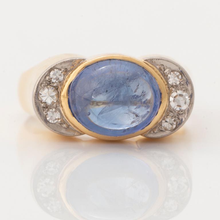 Cabochon cut sapphire and eight cut diamond ring.