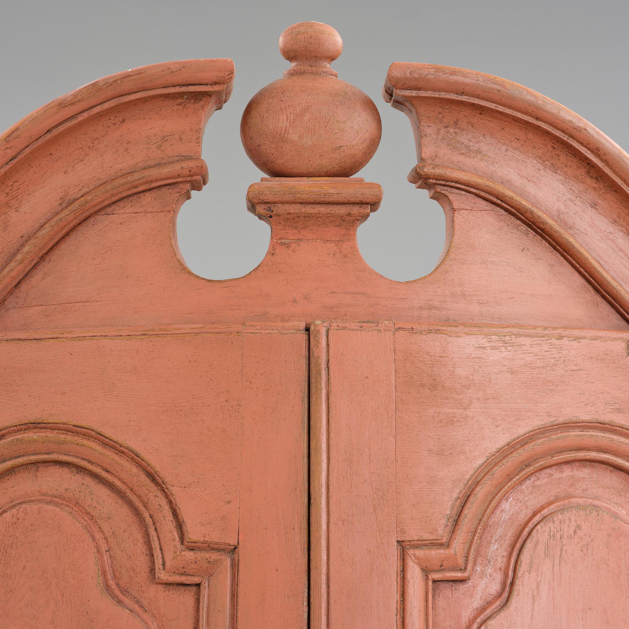 A rococo corner cabinet, later part 18th century.