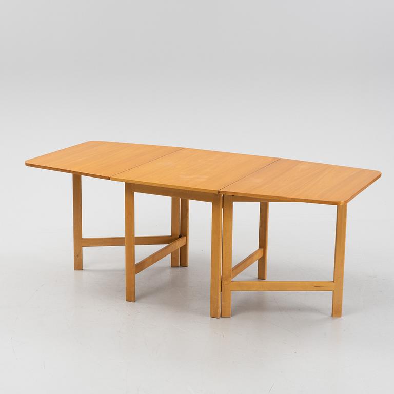 A gate-legged table by Nordiska Kompaniet 1956.