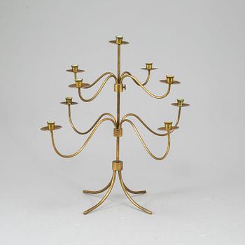 A BRASS CANDELABRUM, second half of the 20th century.