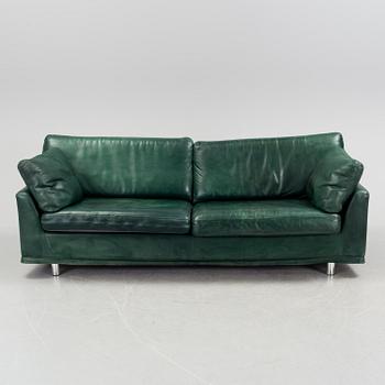 A "Fredrik" green leather sofa by Dux.