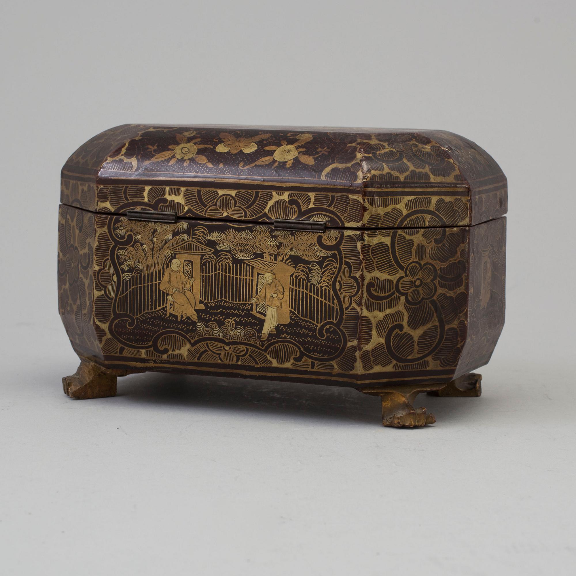 A Chinese Export Lacquerware Tea Caddy with Pewter Fitted Interior, 19th Century.