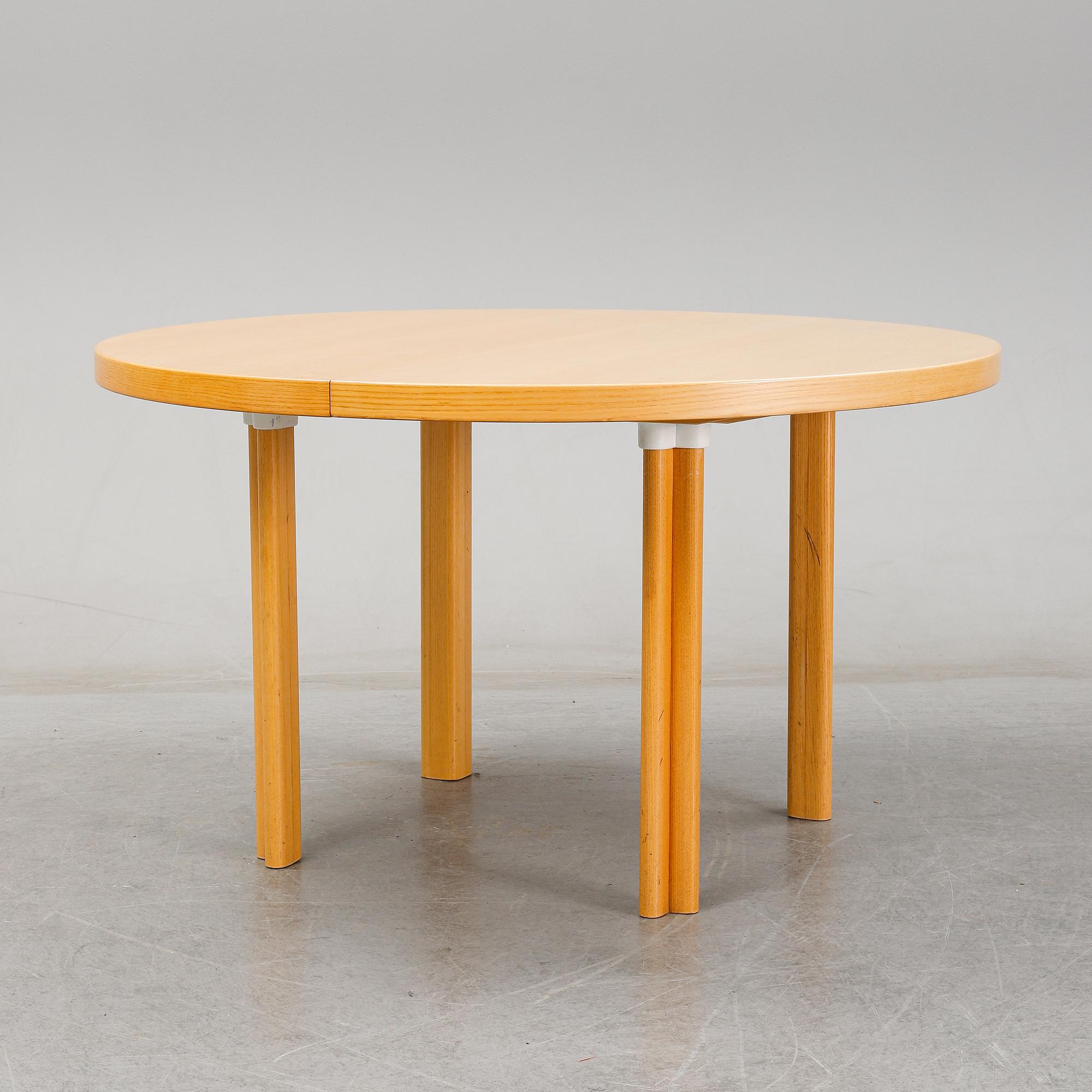 Alvar Aalto, an elm Artek dining table, Finland.