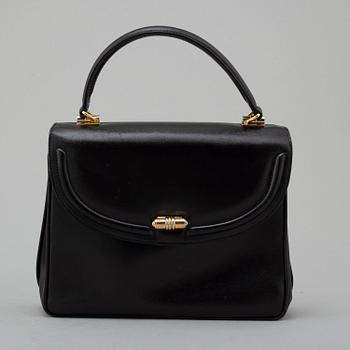GUCCI, black leather bag.