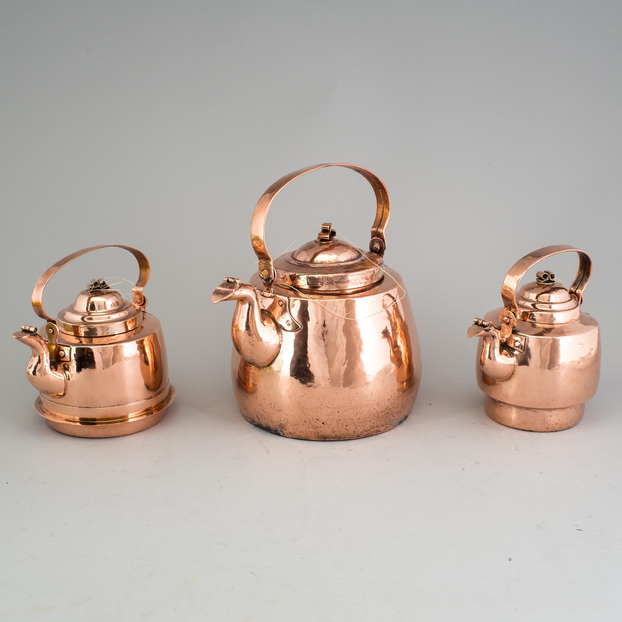 A set of three Pitchers of copper, 19th century, Sweden and Finland.