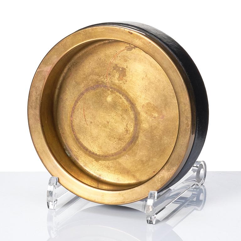 Alvar Aalto, a brass and leather ashtray, Valaistustyö, Finland.