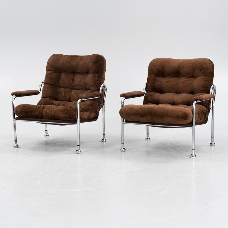 A pair of 'Stålbo' easy chairs by Bo Eigert, 1970's.
