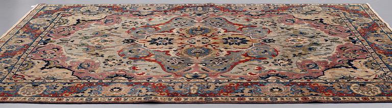 A CARPET, semi-antique, Tabriz, signed Jabarzade ca 337,5 x 242,5 cm.