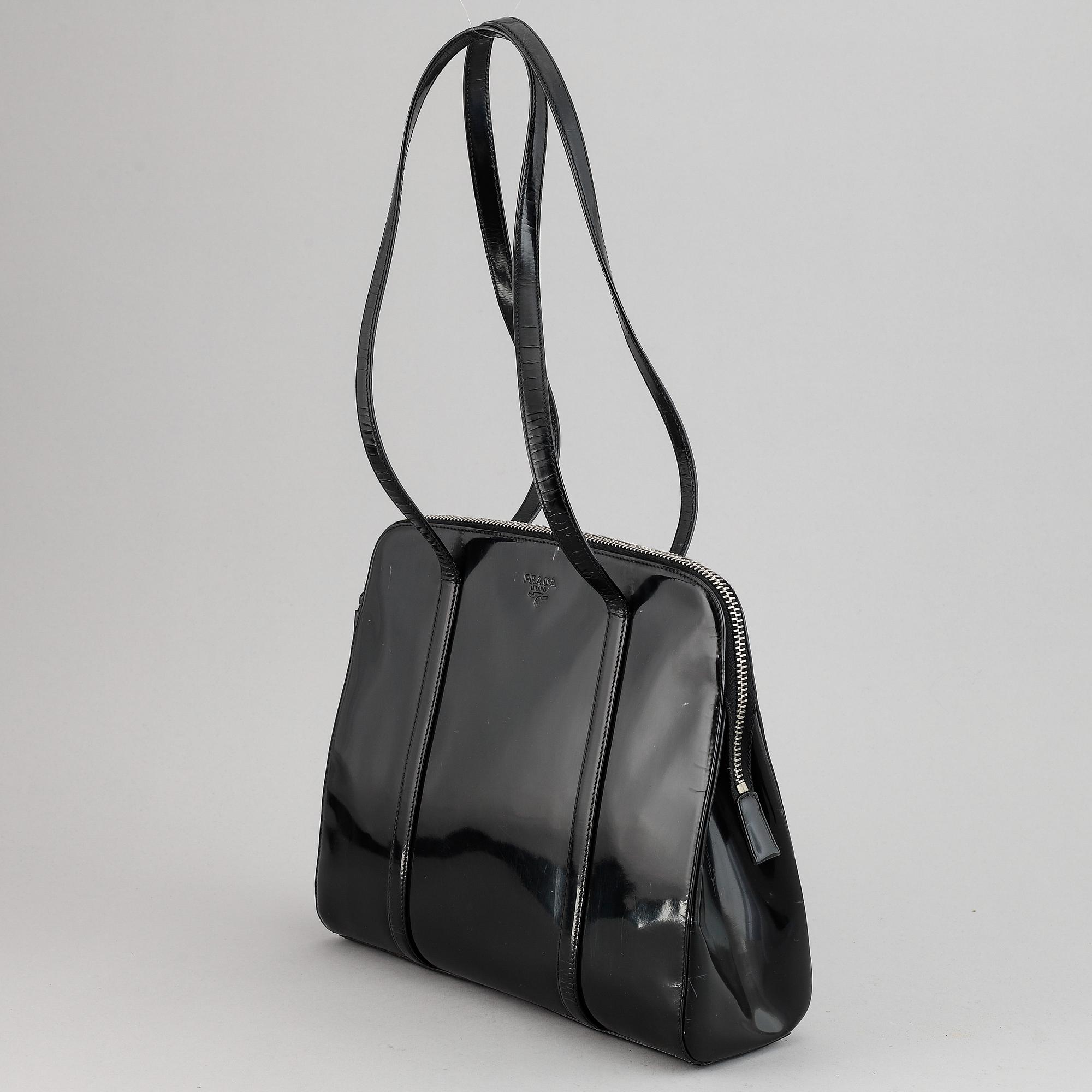 Prada, a patent leather bag.