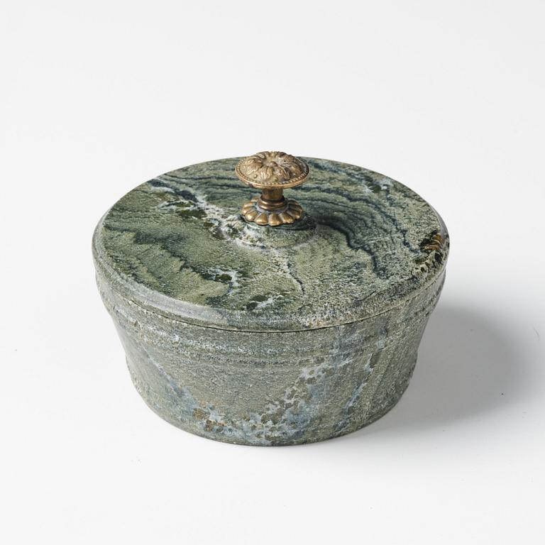 A Swedish Empire 'Kolmård' marble butter box with cover, early 19th century.