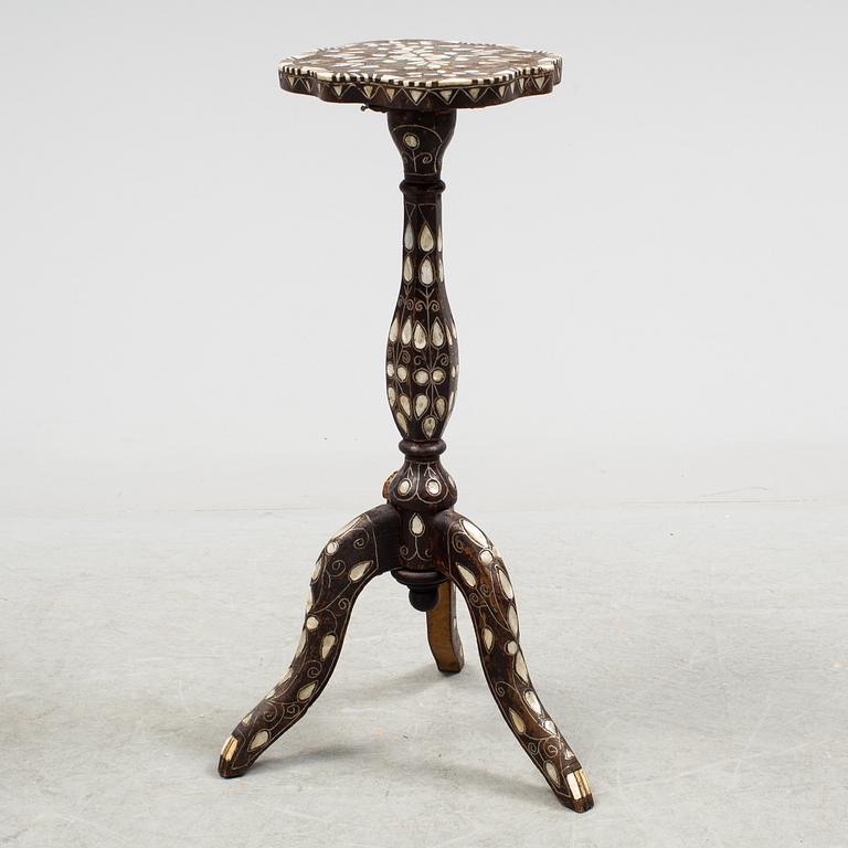 An oriental 20th century mother-of-pearl lamp table.