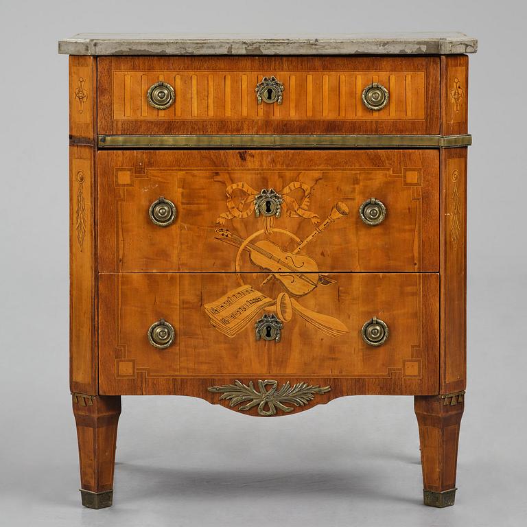 A Gustavian marquetry commode in the manner of F. Foltiern, Stockholm, late 18th century.
