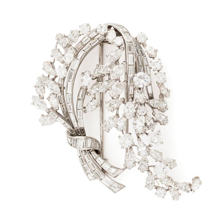 An 18K gold brooch with diamonds in various cuts, Albuquerque.