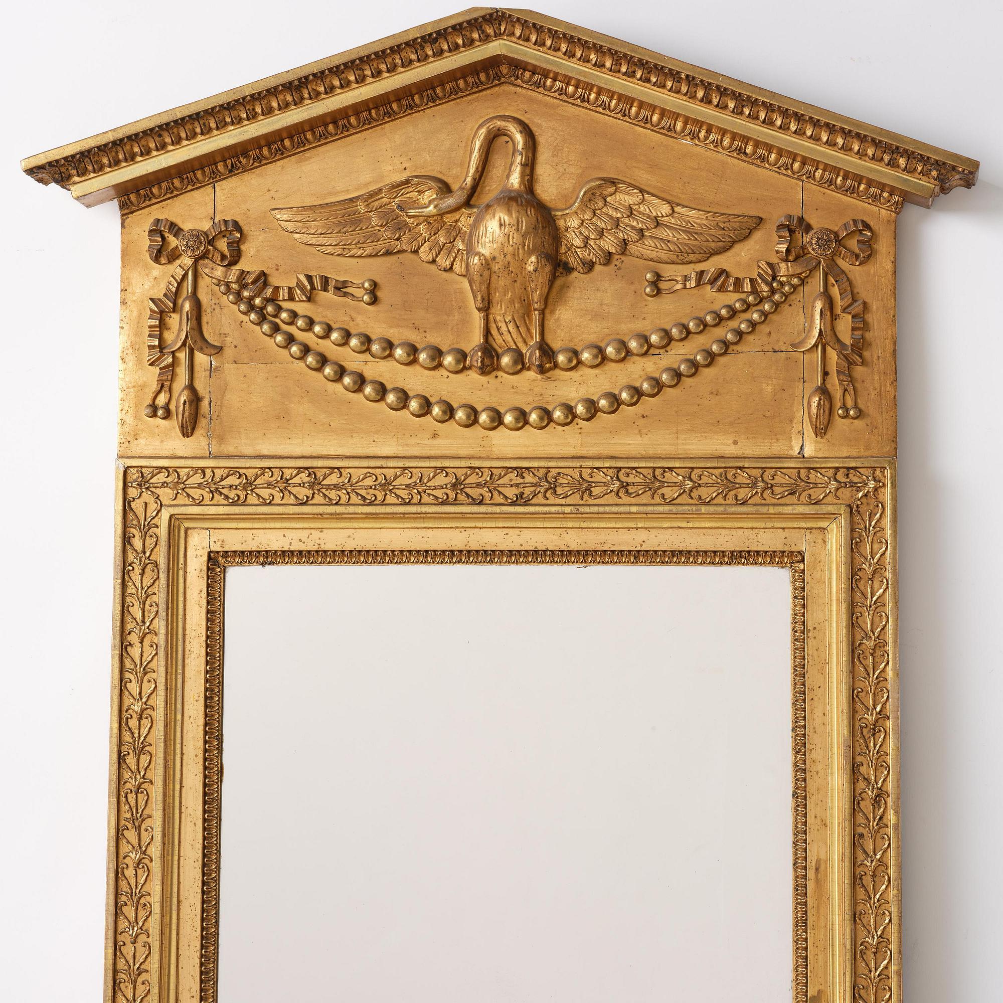 A late Gustavian giltwood mirror, Stockolm circa 1800.