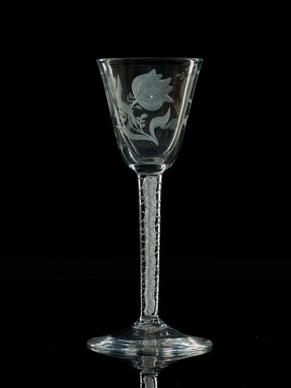 A set of four engraved lattichino glasses, England, 18th Century.