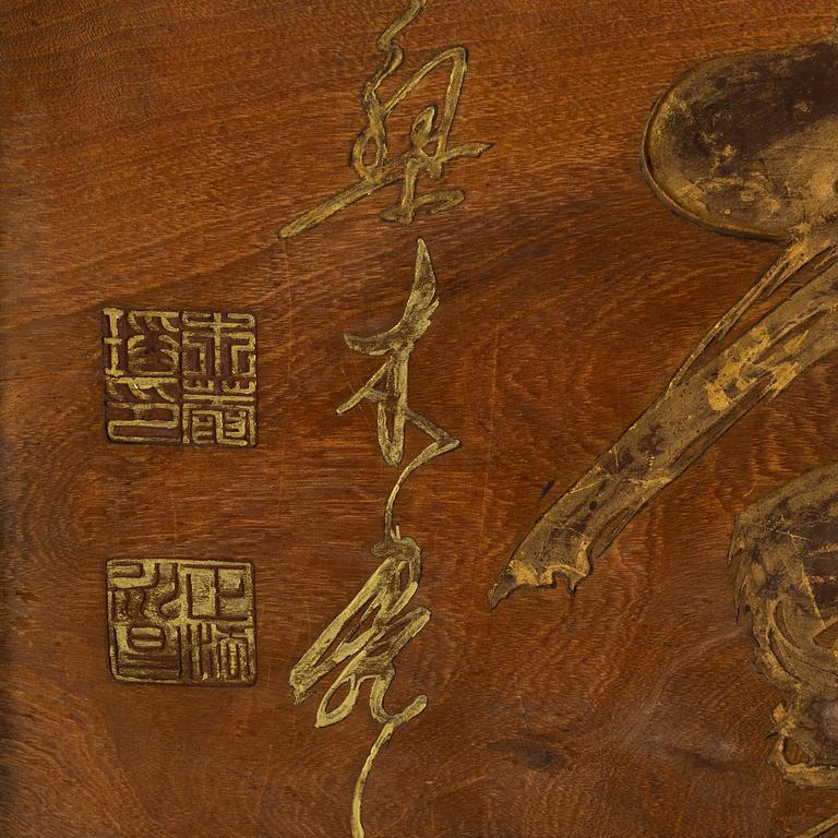 A Japanese carved and gilded wooden sign Edo-period (1603-1868).