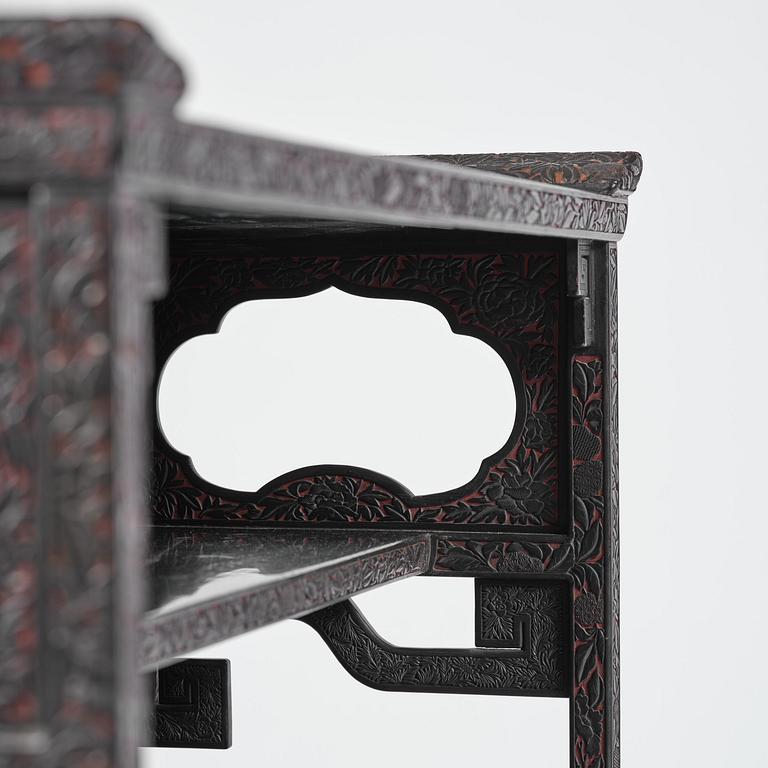 A lacquer display cabinet, late 19th century.