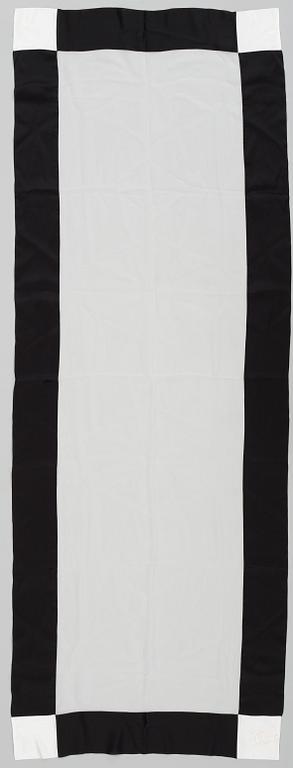 A silk scarf by Chanel.