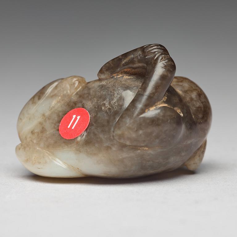 A nephrite figure of a cat, Ming dynasty (1368-1644).