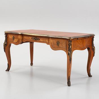 A French Louis XV-style parquetry and gilt bronze-mounted 'bureau plat', late 19th century.