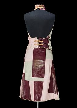A leather and suede top and skirt by Alexander Mc Queen.