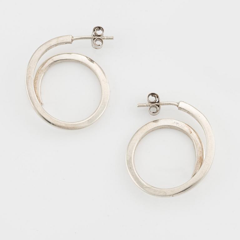 Efva Attling three pair of silver earrings.
