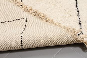A moroccan rug, 295 x 205 cm.