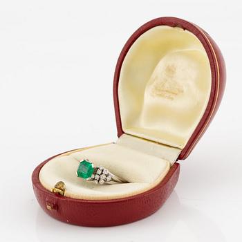 A W.A. Bolin ring 18K white gold with an emerald-cut emerald and brilliant-cut diamonds.
